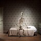 Illustration for article titled How did this giant animal skeleton get into a nice suburban home?